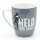 Kaffeebecher / Tasse aus Porzellan, Motiv: Held des Tages. Gr&ouml;&szlig;e H/&Oslash;: 9,8 x 8,2 cm, Fassungsverm&ouml;gen 250 ml, Sp&uuml;lmaschinengeeignet.