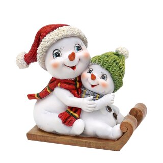 Schneekinderpaar - Schneem&auml;nner mit M&uuml;tze und Schal in rot-gr&uuml;n auf Schlitten, L/B/H 14 x 7 x 12 cm